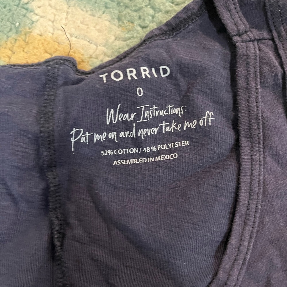 Torrid tank, navy blue with fade.  Says “Drinks well with others.”